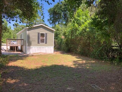 Back yard to mobile home
