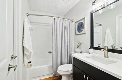 Full bathroom with shower / bathtub combination wi