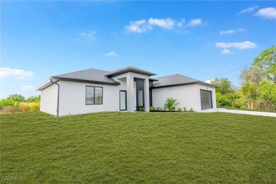 140 Pennfield St, Lehigh Acres, FL 33974 - photo 2