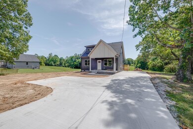 Long Concrete Drive, Turnaround & Sidewalk
