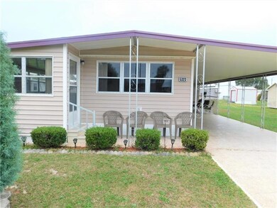 Home has a front covered patio area.