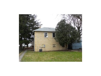 Rear View of 3 Car Garage.