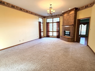 Living Room with Double-sided Fireplace