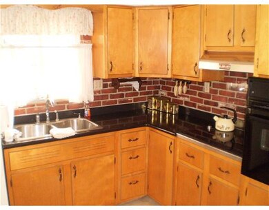Kitchen. Eat-in kitchen has electric cook top and 