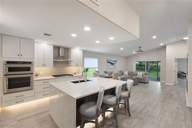 Kitchen with sink, stainless steel double oven, wa