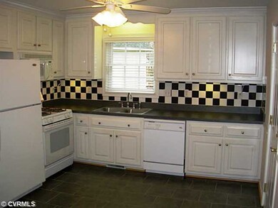 Kitchen - Tile floor, upgraded cabinets, and tile 