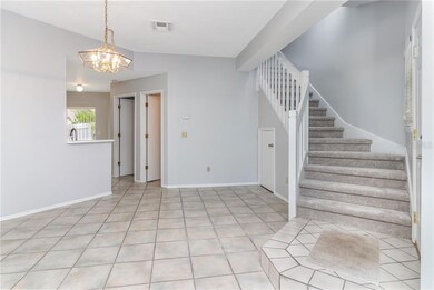 stairs and dining area
