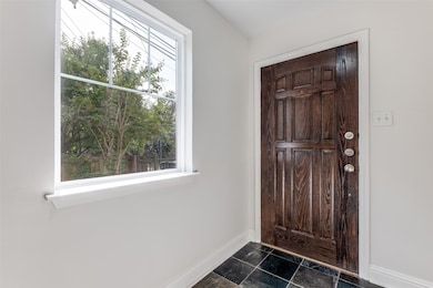 Foyer featuring baseboards