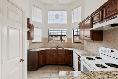 The kitchen features granite countertops.