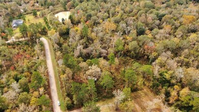 Another side view of the property with a peek of the neighbors.