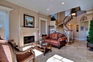 High-end touches include elegant crown molding, re