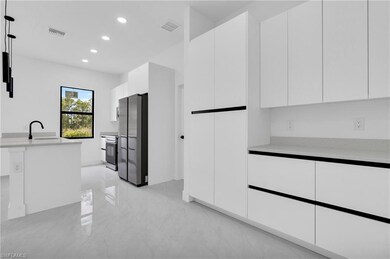 746 Colyer St E, Lehigh Acres, FL 33974 - photo 5