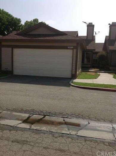 2 Car Garage with newer roll up garage door. View 