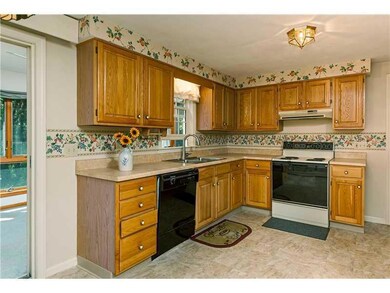 Kitchen. The kitchen offers ample...