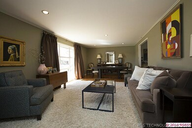 Large, updated Formal Living Room with hardwood fl