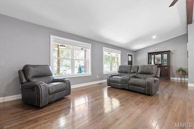 an L-shaped sectional would fit perfectly in here!