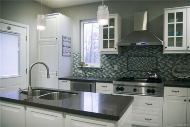 Beautiful crushed glass topped island with double 