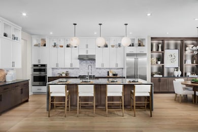 Kitchen featuring appliances with stainless steel