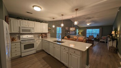 Kitchen with white appliances, kitchen peninsula, 