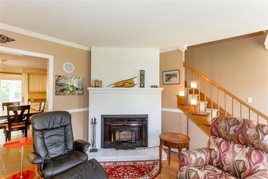 View of fireplace with wood stove...