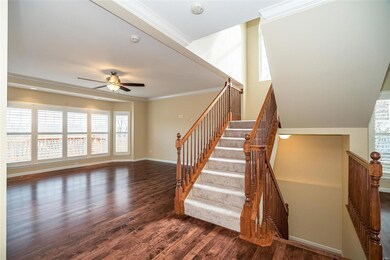 Staircase is tucked to the side in this home, and 