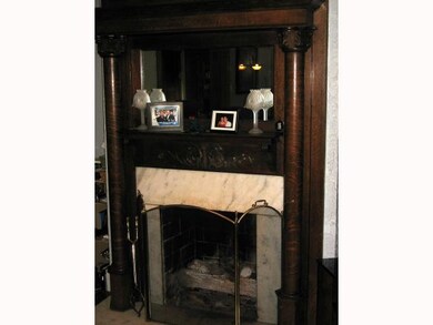Beautiful Woodwork In Living Room Fireplace.
