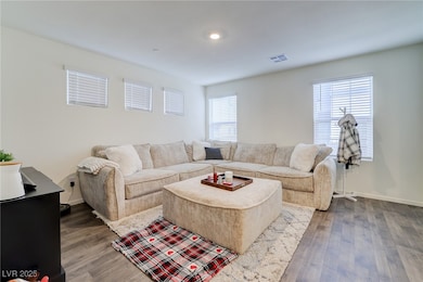 Living room featuring dark wood-type flooring