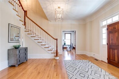 Elegant foyer looking towards library. First floor