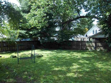 Fenced in backyard for kids to play or animals to 