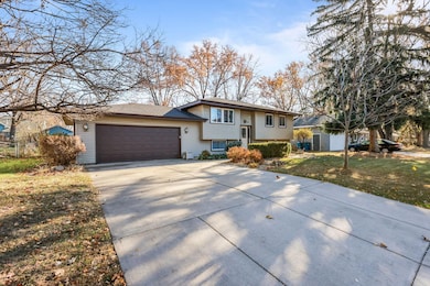 Two Car garage with concrete driveway