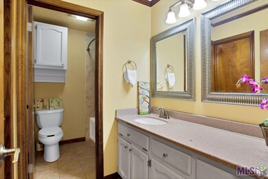 The Master/Guest Bath downstairs is spacious, with