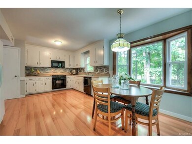 The spacious kitchen has plenty of room for any co