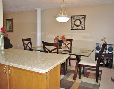 Dining Room. Granite topped breakfast bar to dining room