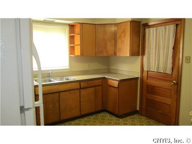 Kitchen. Light & bright eat-in Kitchen features lo