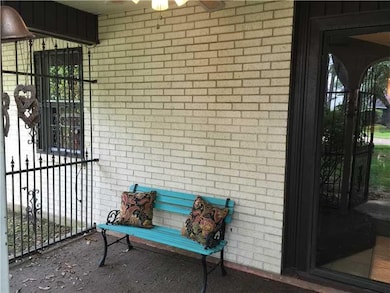 Patio/Deck. GATED FRONT PORCH WITH CEILING FAN