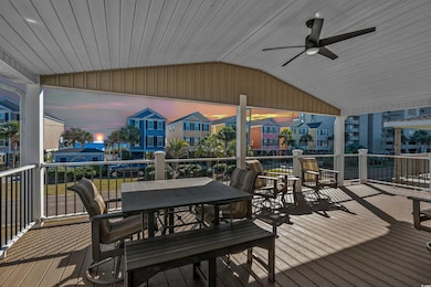 Deck at dusk featuring ceiling fan