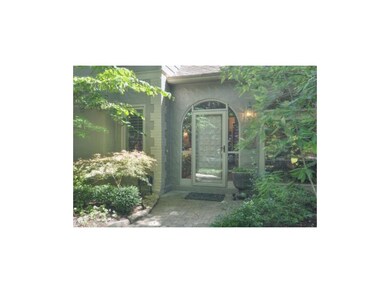 Beautifully landscaped walk to the front door.
