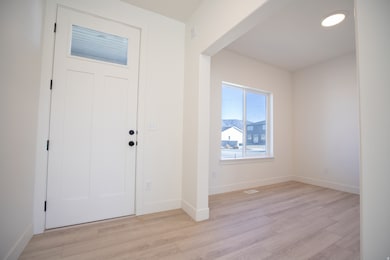 Entry opening to living room.