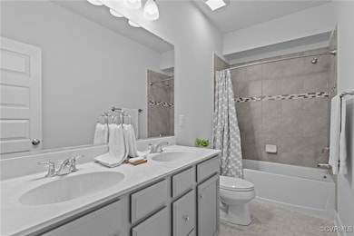 Full bath featuring shower / bathtub combination w