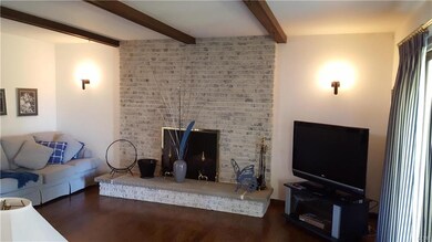 Pretty nice, right? Family Rm with full wall brick