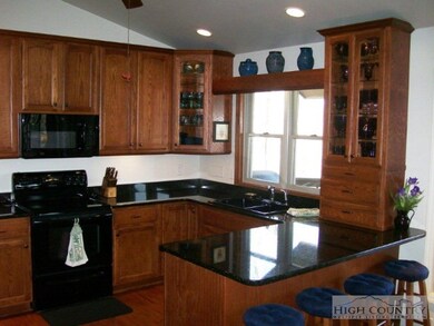 A window over the kitchen sink allows the long ran