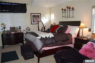 Master bedroom has vaulted ceilings, walk in close
