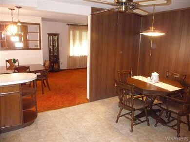 Kitchen Dining Eat in kitchen flows into dining ro
