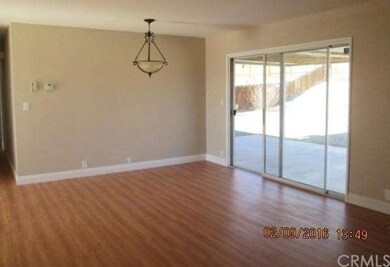Dining area off living room.  Sliding door leads t