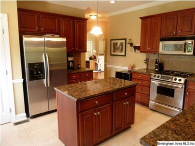Large kitchen with granite counters
