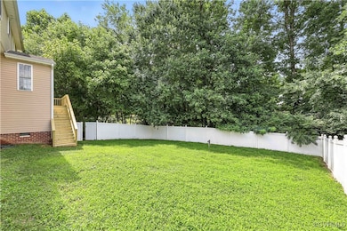 Fully Vinyl Fenced backyard