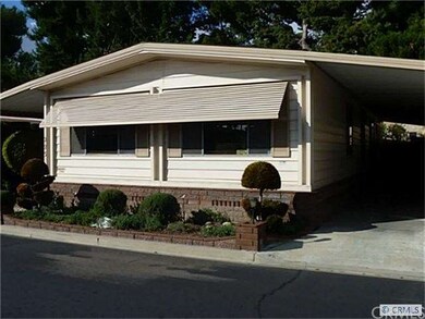 Wide carport handles two vehicles with ease.