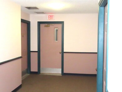 Unit K is on the left, other door leads into the rear hallway