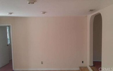 Looking in to step down family room