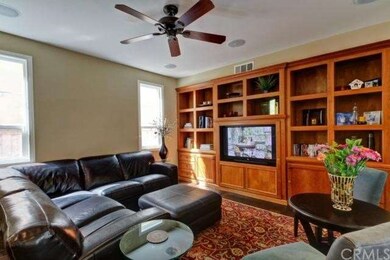 Spacious Family Room Boasts a Built-In Media Cente